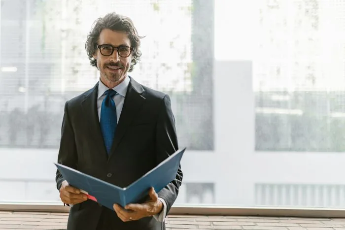 Experienced professional reviewing business documents
