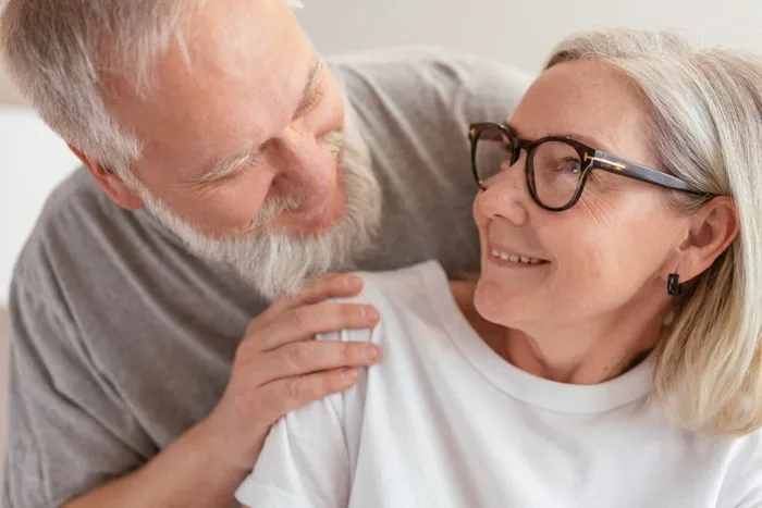 An older couple sharing a relaxed moment at home